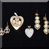 J02. Gold and diamond pendants and earrings. 